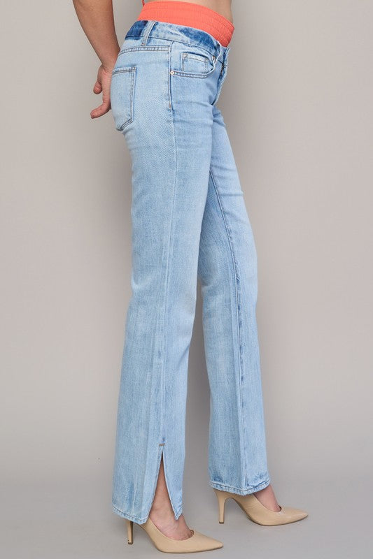 Light wash low-rise jeans with a straight-leg fit for women.