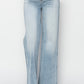 Risen jeans with wide-leg silhouette and raw hem in light wash
