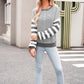 Lightweight gray round neck sweater made with a soft cotton-acrylic blend.






