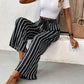 Versatile black and white striped pants ideal for any occasion