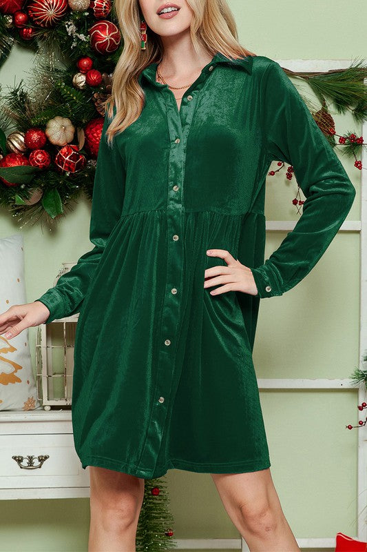 Festive green velvet dress with button-up front, ready for holiday celebrations
