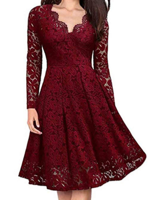 Front view of long-sleeve red lace dress with scalloped neckline and A-line fit.
