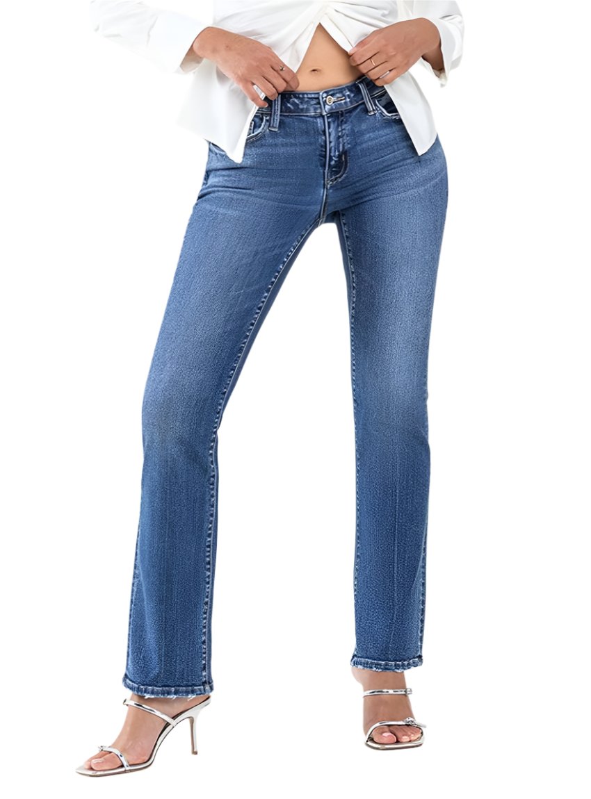 Front view of low-rise slim bootcut jeans in medium blue wash.