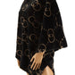 patterned black poncho in soft fleece material
