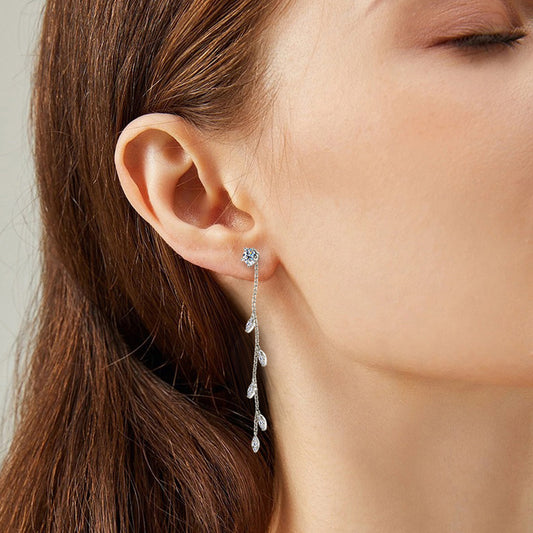 Luxury silver leaf earrings with moissanite stones
