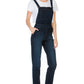 Casual outfit styled with dark wash denim overalls and a white tee.
