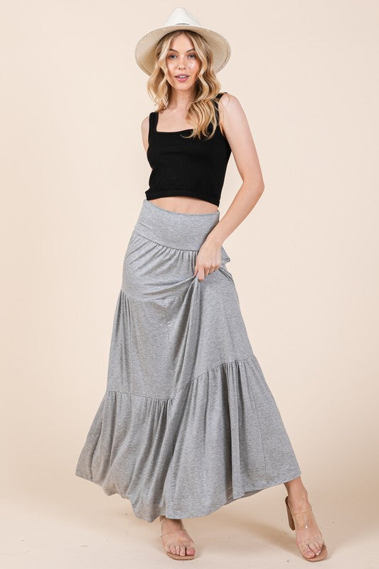 Foldover waistband maxi skirt in gray with tiered ruffle design.
