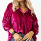 Soft magenta velvet button-down top perfect for layering.
