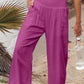 Magenta smocked waist wide leg pants with pockets
