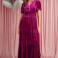 Luxurious magenta velvet maxi dress featuring a shirred waist and pockets
