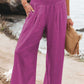 Women's magenta wide leg pants with a comfortable smocked waistband
