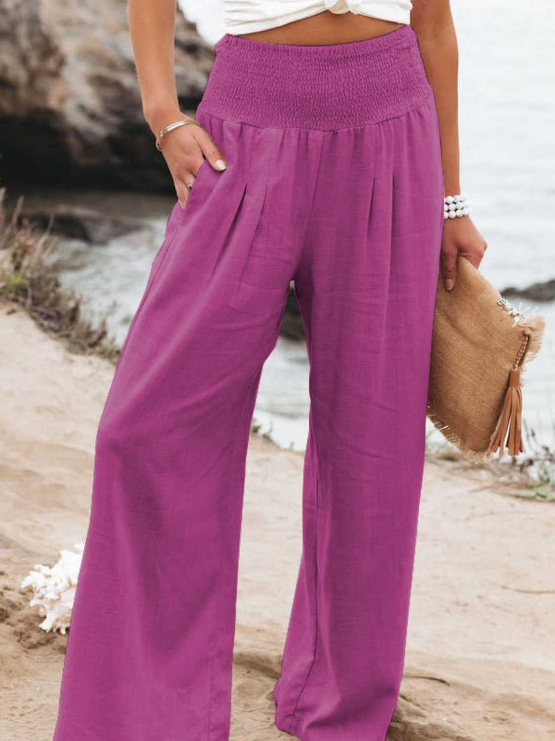 Women's magenta wide leg pants with a comfortable smocked waistband
