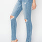 Medium-wash skinny jeans with distressed knees for an edgy, laid-back look
