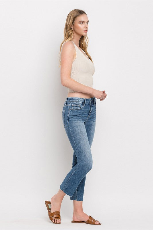 Classic cropped slim straight jeans in medium wash for a timeless look.
