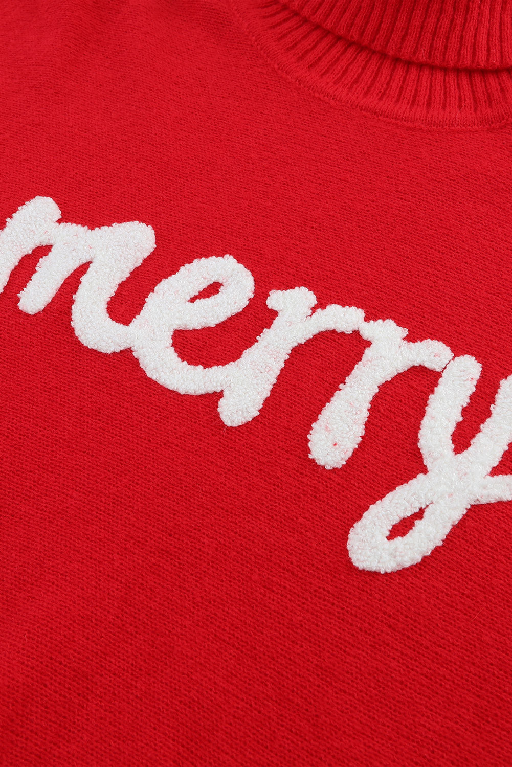 Red sweater with turtleneck and embroidered "Merry" lettering for a festive look
