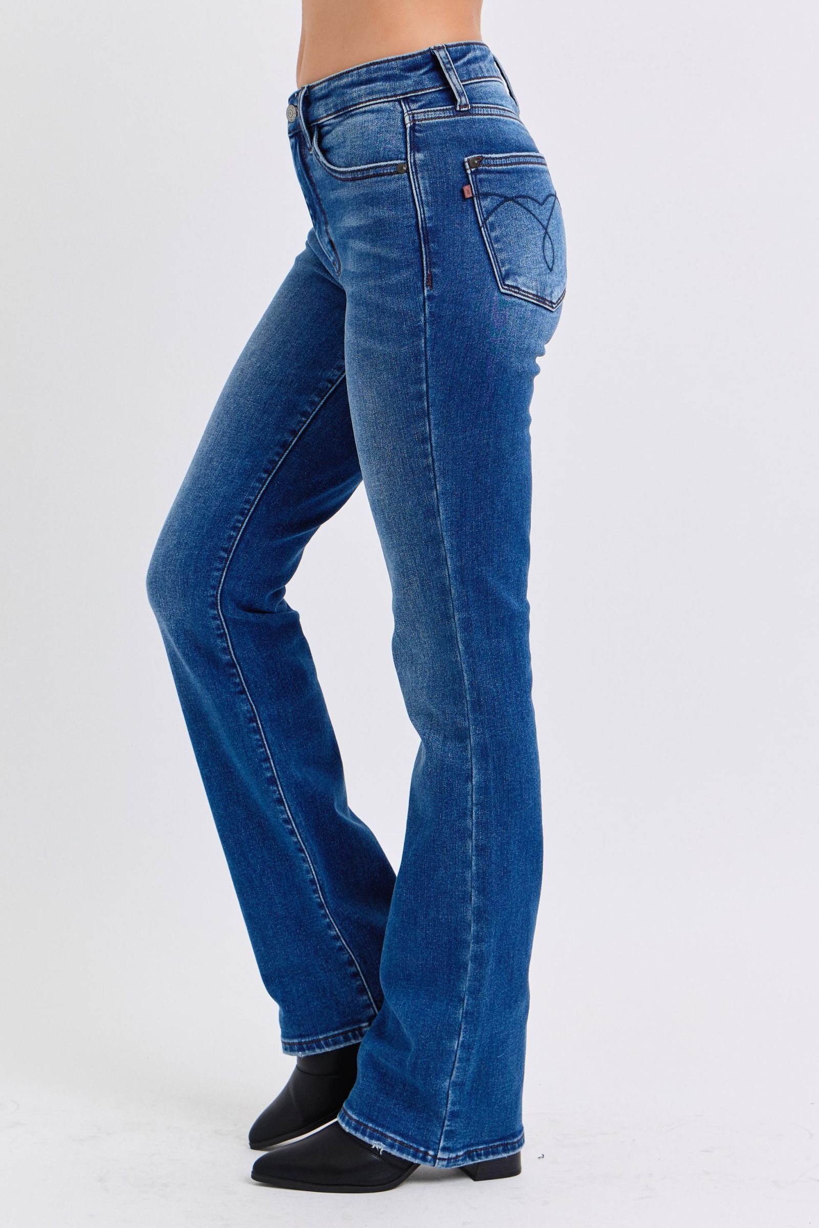 Women's dark wash mid-rise jeans featuring a classic bootcut silhouette
