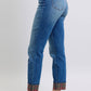 Women’s mid-waist denim with plaid accents for casual wear.
