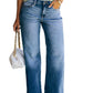 Front view of mid-waist washed denim jeans
