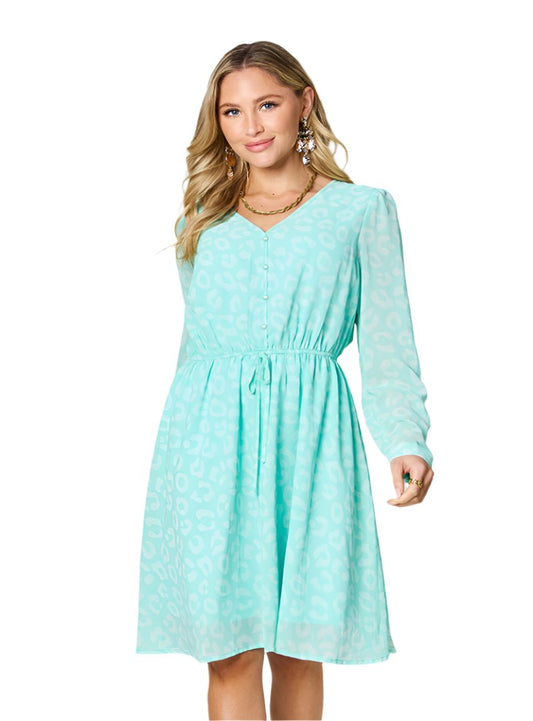 Mint leopard print dress with V-neck and ruched waist, perfect for casual wear.
