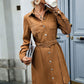 Stylish mocha button-up dress with long sleeves and functional flap pockets.
