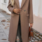 Women’s mocha winter coat with elegant lapel collar and practical pockets.
