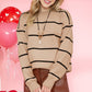 Styled mocha striped knit sweater paired with casual brown leather pants.






