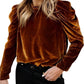 Front view of a mocha velvet frill neck top with long sleeves.
