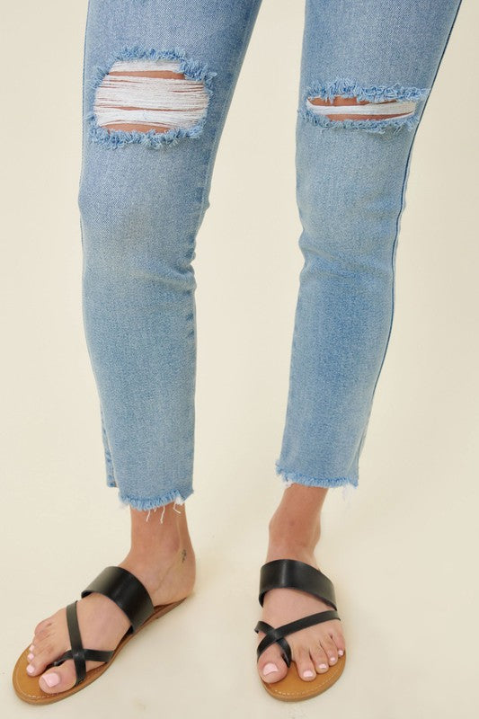 Vibrant M.i.U high waisted skinny jeans with distressed knee
