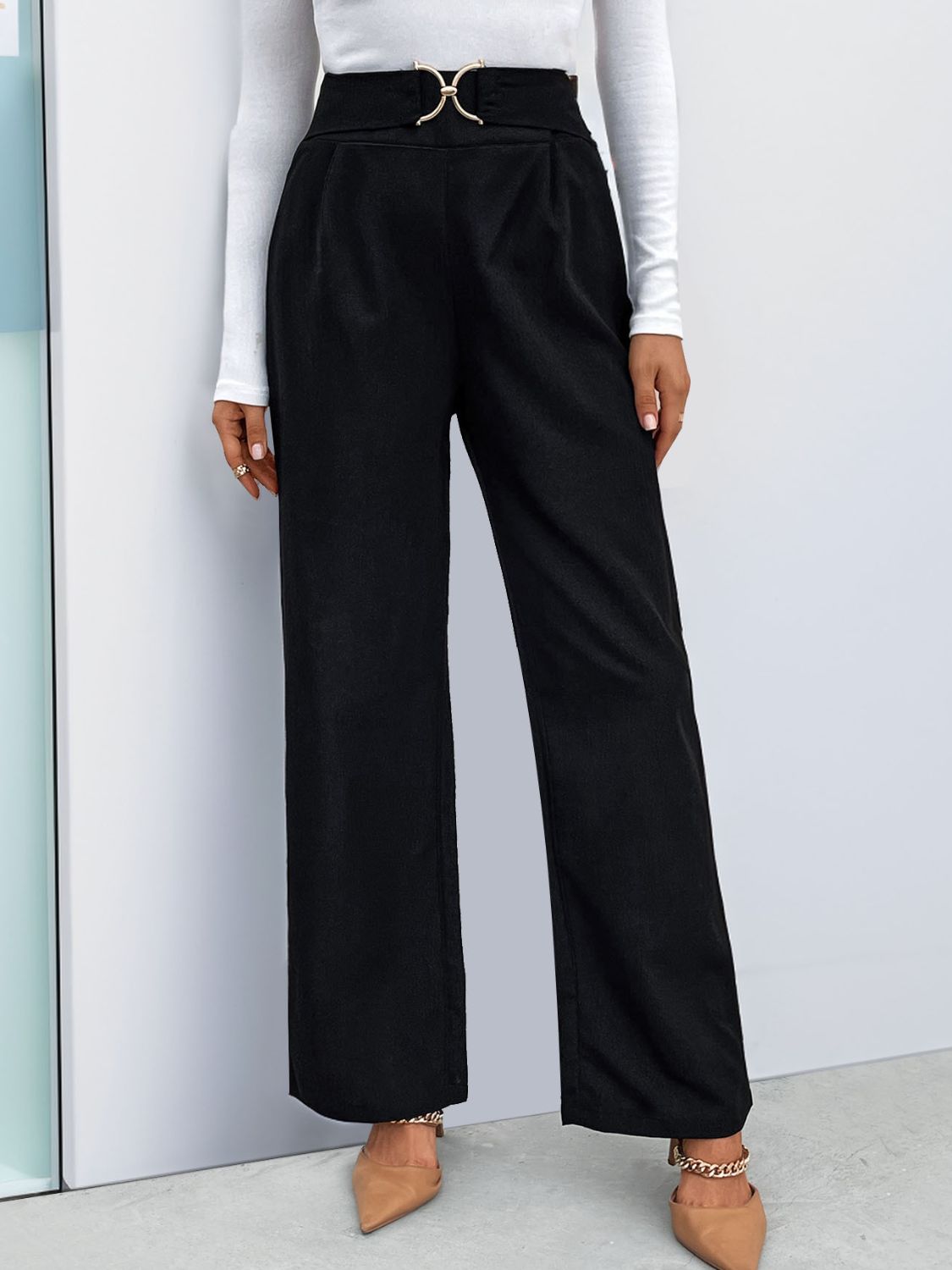 Chic high waisted straight leg pants in black, offering a flattering, streamlined silhouette.
