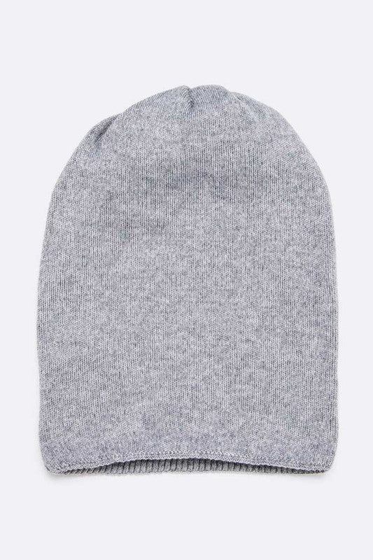 Sleek light gray winter beanie with convertible layered design

