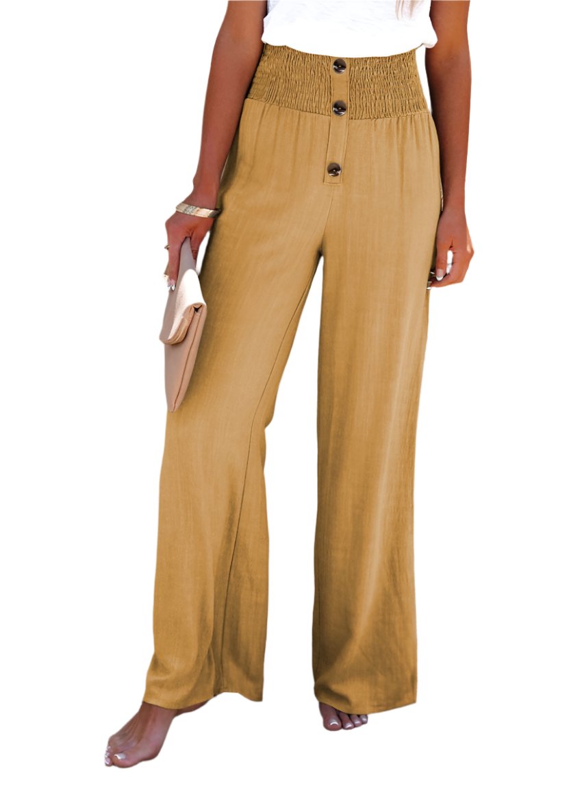 Mustard wide-leg pants featuring a high waist and smocked waistband for a relaxed fit.