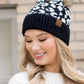 Black winter leopard print beanie with a soft and stretchy fit for teens and adults
