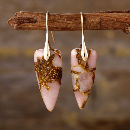 Gold geometric earrings with pink natural stone design
