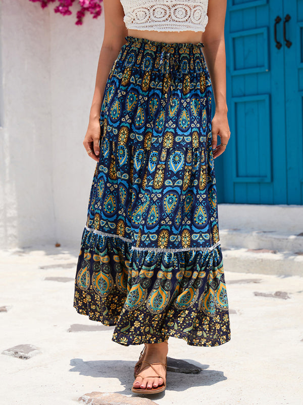 Closeup of the detailed navy bohemian print on the lightweight maxi skirt.
