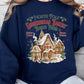 Classic navy sweatshirt with holiday-themed North Pole Gingerbread Bakery graphic.