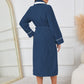 Navy plush robe with a warm, comfortable design for homewear.
