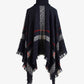 Cozy navy plaid poncho with fringe and turtleneck design.
