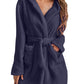 Navy plush robe with hood, ideal for autumn and winter relaxation.
