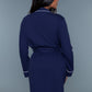 Back view of a navy waffle robe showing the belted waist and relaxed fit.
