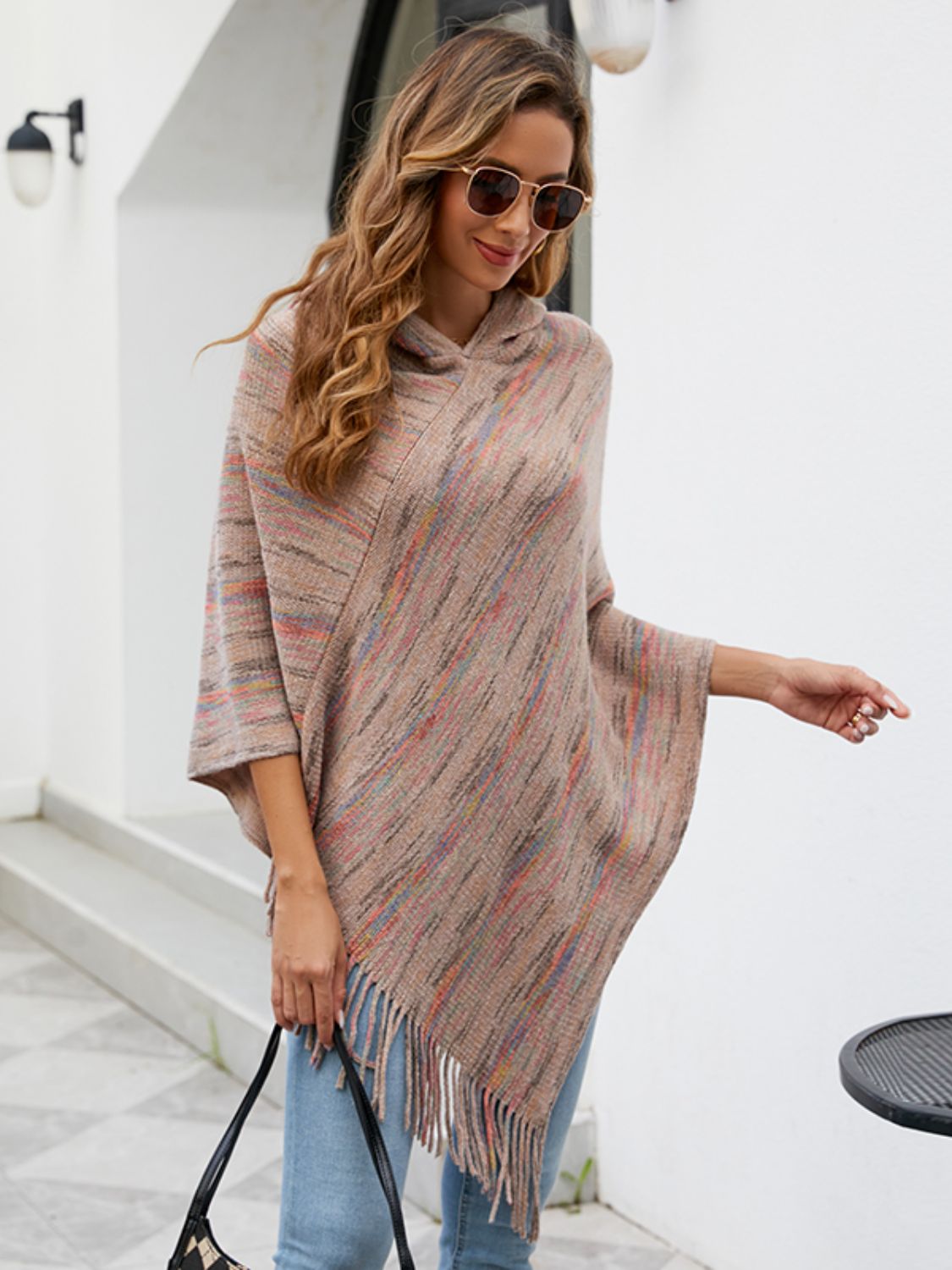 Khaki knit poncho with multicolor pattern for fall
