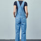 Casual medium wash denim overalls with distressed knee details and high waist.
