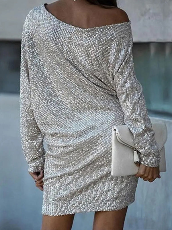 Silver sequin dress with off-shoulder neckline for a glamorous look.
