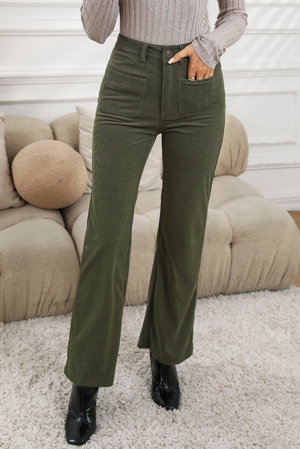 Olive straight-leg pants featuring a high waist and pockets.