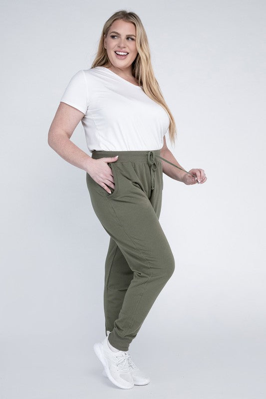 Side profile of olive jogger pants with a relaxed fit and drawstring waistband.
