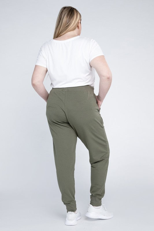 Olive jogger pants with functional side pockets for practical everyday wear.
