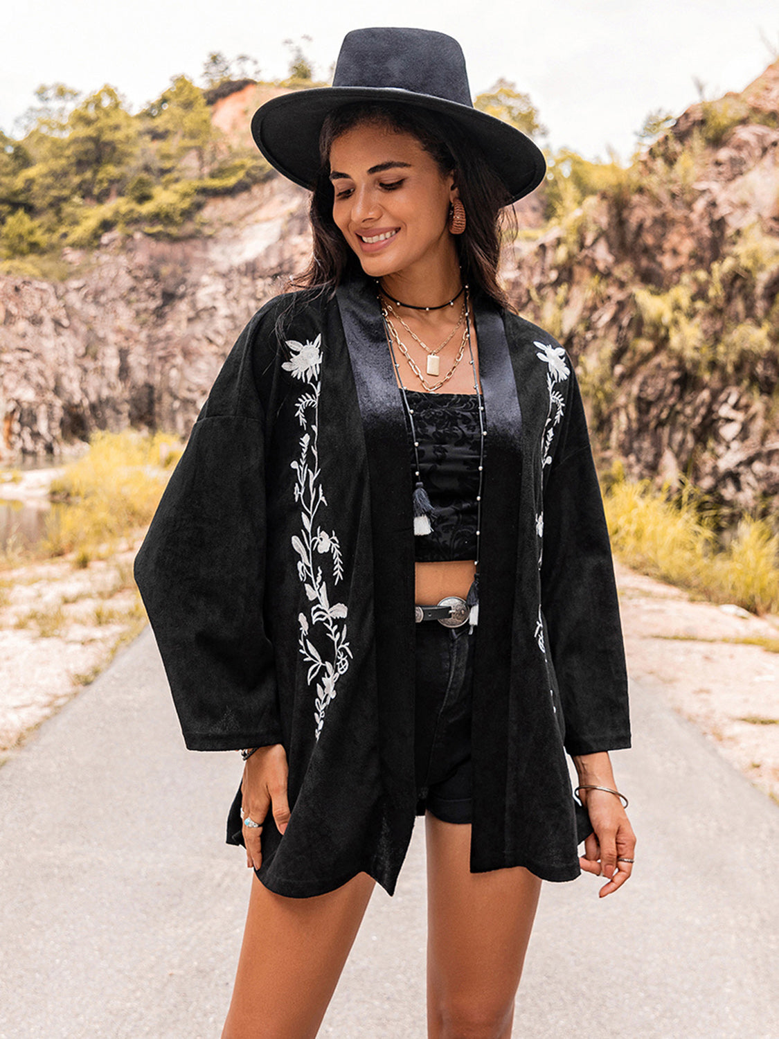 Open-front black kimono cardigan with white floral embroidery, women’s.
