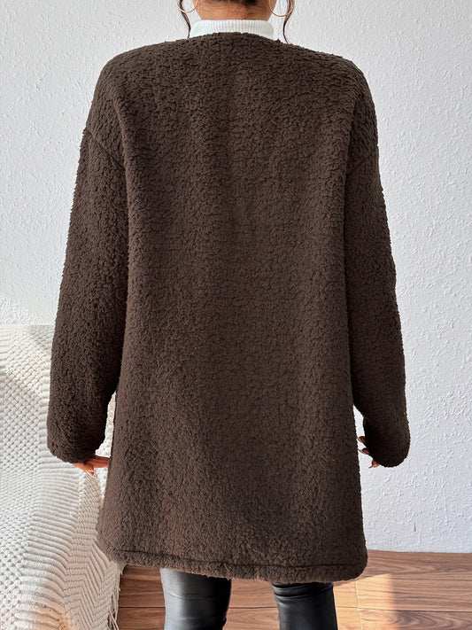 Cozy brown coat for women with a relaxed fit, ideal for casual layering.
