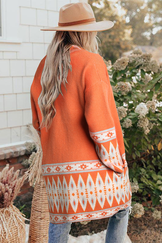 Soft tribal print cardigan in bold orange and earthy tones
