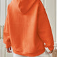 orange hoodie with drawstring and waffle knit fabric
