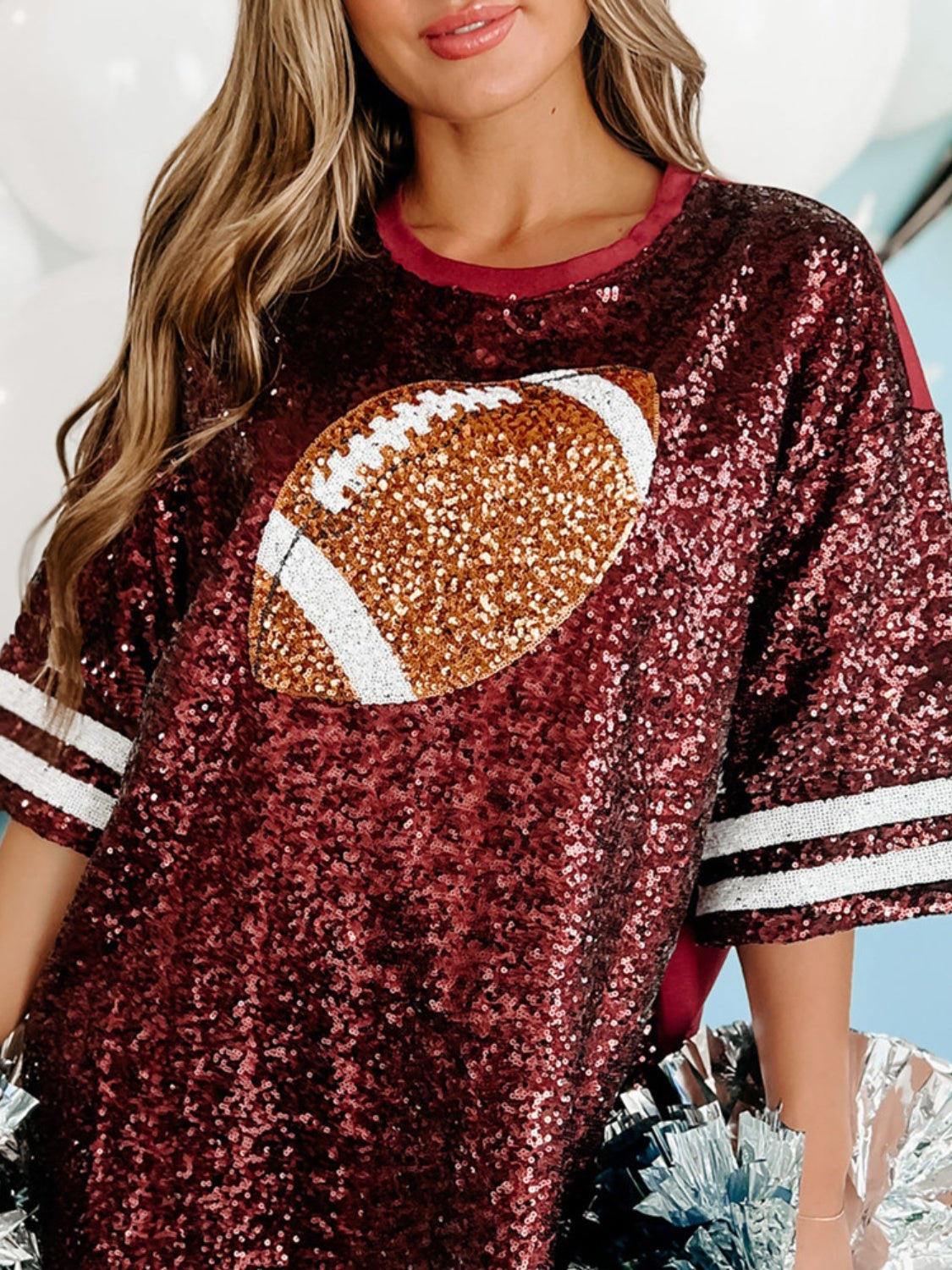 Sparkly sequin football shirt in burgundy, featuring oversized fit and football graphic.